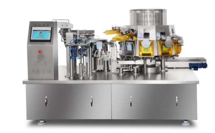 給袋真空包裝機.jpg www.zhaopianba.cn